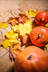 Image showing Pumpkins on grunge wooden backdrop background