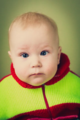 Image showing Portrait Of Sad Baby Boy Looking At The Camera With Beautiful Ey