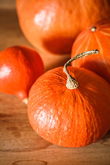 Image showing Pumpkins on grunge wooden backdrop background