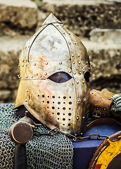 Image showing Protective helmet with a visor on medieval knight 