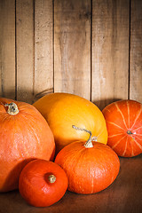 Image showing Pumpkins on grunge wooden backdrop background