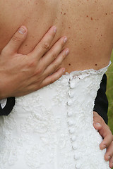 Image showing Hands on back
