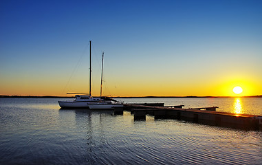 Image showing Boats in Alqueva dam at sunset