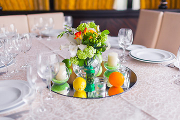 Image showing tables decorated with flowers