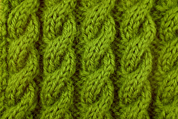 Image showing Closeup of green cable knitting stitch