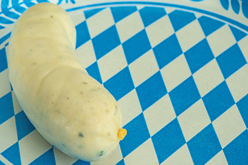 Image showing veal sausage dish with Bavarian colors