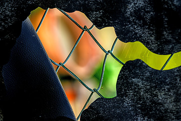 Image showing fence with colorful background
