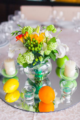 Image showing tables decorated with flowers and fruit