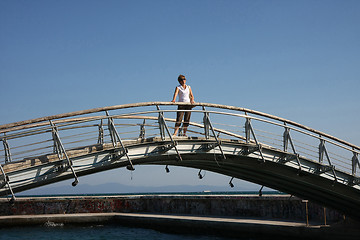 Image showing Lady on the bridge