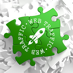 Image showing Web Traffic Concept on Green Puzzle Pieces.