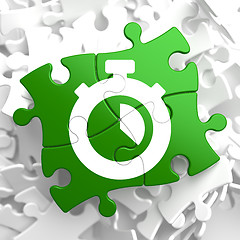 Image showing Stopwatch Icon on Green Puzzle.