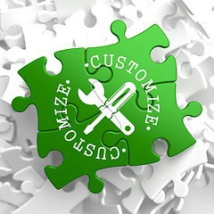 Image showing Customize Concept on Green Puzzle Pieces.
