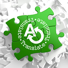 Image showing Translating Concept  on Green Puzzle Pieces.