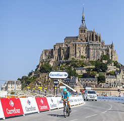 Image showing Cycling in Front of Le Mont Saint Michel