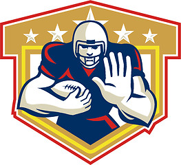 Image showing American Football Running Back Fending Shield