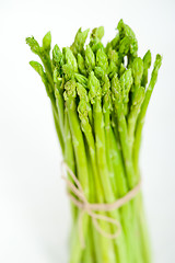 Image showing fresh asparagus over white