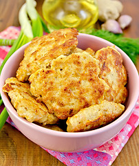 Image showing Fritters chicken with spices on board