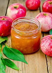 Image showing Jam apple with apples on the board