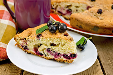 Image showing Pie with black currant on the board