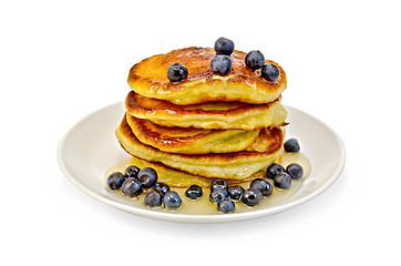 Image showing Flapjacks with blueberries and honey