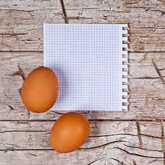 Image showing eggs and blank paper