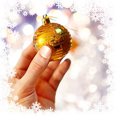Image showing Christmas-tree decoration on hand