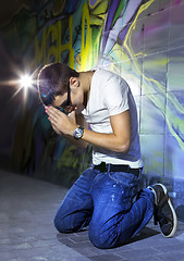 Image showing young man offers prayers