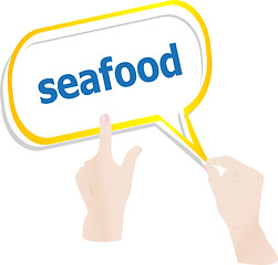 Image showing hands push word seafood on speech bubbles