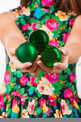 Image showing Young woman hands with christmas ball