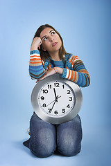 Image showing Clock Woman thinking