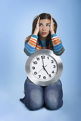 Image showing Clock Woman thinking