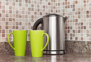 Image showing Electric kettle and cups in the kitchen