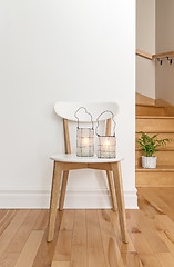 Image showing Lanterns on a white chair