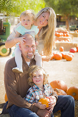 Image showing Attractive Family Portrait at the Pumpkin Patch
