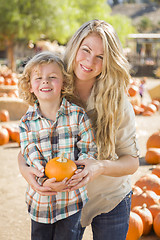 Image showing Attractive Mother and Son Portrait at the Pumpkin Patch
