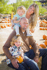 Image showing Attractive Family Portrait at the Pumpkin Patch
