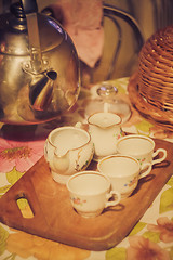 Image showing Teapot Tea Flow In Cup, Tea Ceremony 