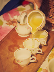 Image showing Teapot Tea Flow In Cup, Tea Ceremony 