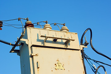 Image showing Old transformer against blue sky