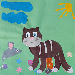 Image showing Children's odd job with mouse and cat