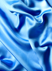 Image showing Smooth elegant blue silk as background 