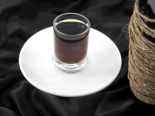 Image showing wine bottle and wine glass on white plate