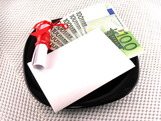 Image showing euro money on plate, knife, diamonds and gift bow on white paper