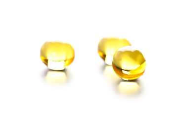 Image showing thre yellow gelatin pills 