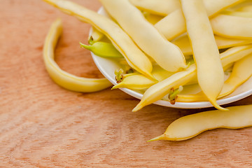 Image showing Yellow Kidney Beans In A Bowl On Wooden Table