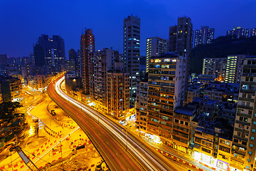 Image showing Colorful city night with lights of cars motion blurred in hong k