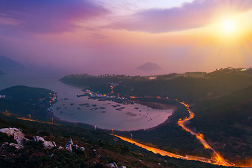 Image showing Amazing sunrise and sea of cloud with mountains and tree 