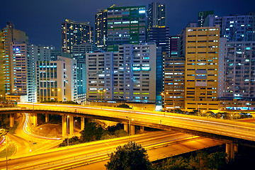 Image showing urban area dusk, busy traffic 