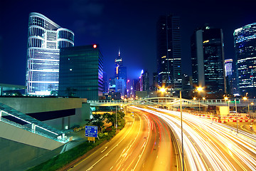 Image showing Colorful city night with lights of cars motion blurred in hong k