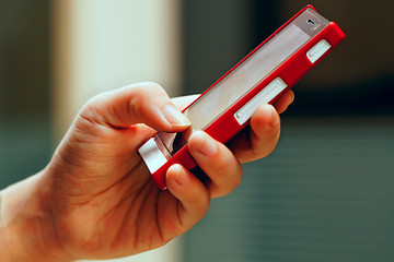 Image showing Mobile phone in man hand 